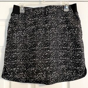NWOT Black and White Active Tennis Skirt with pockets and BuiltIn Shorts